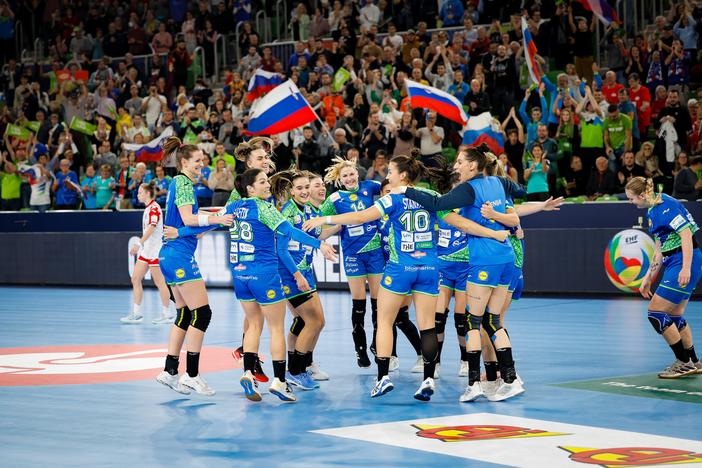 SUMMARY: Slovenia, Denmark open main round with important wins